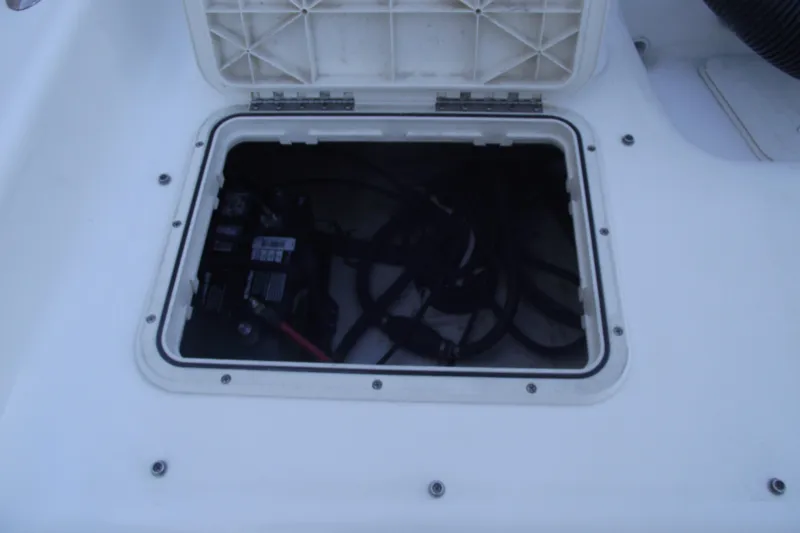 Slide: The Image of Open hatch on Savannah SS21 boat, revealing internal components, 2021 model. - 28