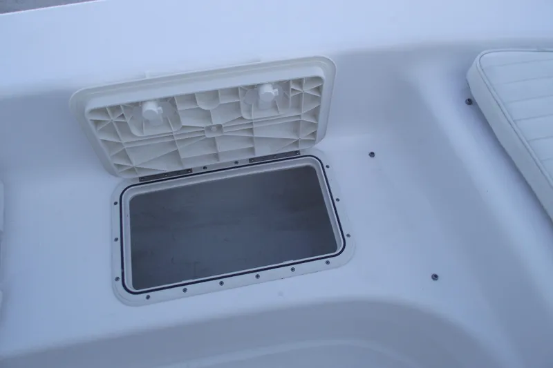 Slide: The Image of Open storage compartment on a 2021 Savannah SS21 boat deck. - 8