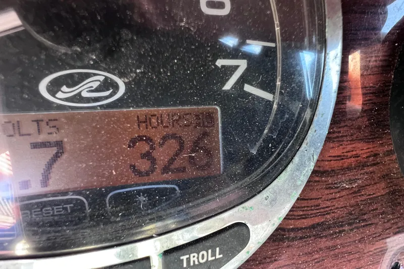 Slide: The Image of Close-up of 2006 Sea Ray 240 Sundeck dashboard showing 326 engine hours. - 21