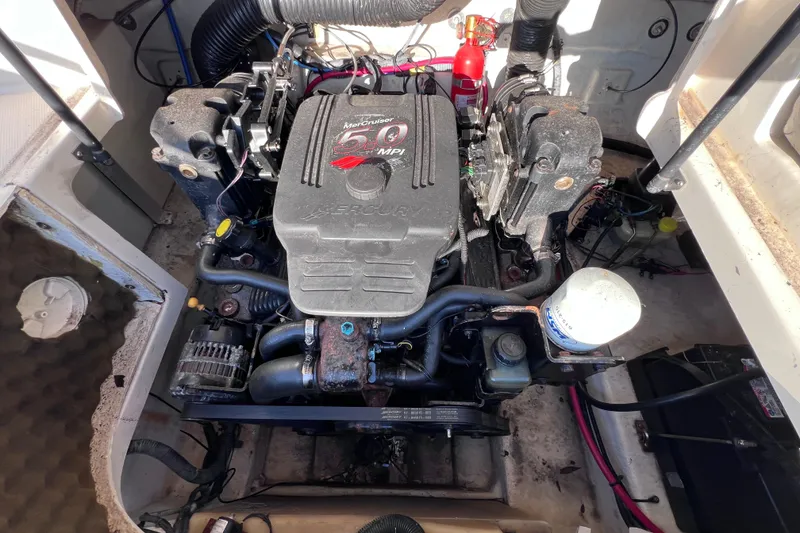 Slide: The Image of Engine compartment of a 2006 Sea Ray 240 Sundeck with MerCruiser 5.0 MPI engine. - 28