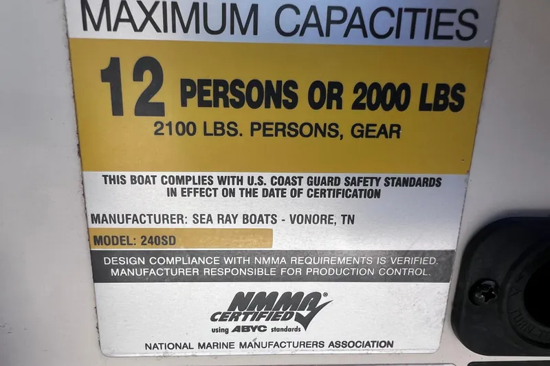 Slide: The Image of Capacity label for 2006 Sea Ray 240 Sundeck, 12 persons or 2000 lbs. - 30