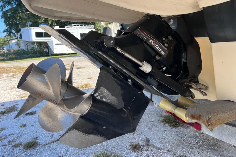 Slide: The Image of Close-up of a 2006 Sea Ray 240 Sundeck's MerCruiser propeller and drive system. - 9