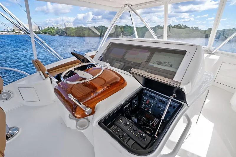 Slide: The Image of Luxurious helm of 2015 Viking 66' Convertible yacht with advanced navigation systems. - 17