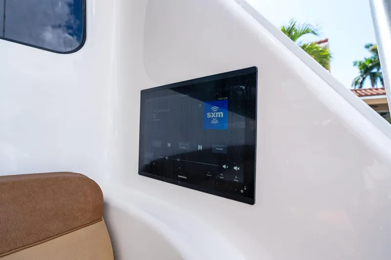 Slide: The Image of Touchscreen control panel on 2015 Viking 66' Convertible yacht, displaying audio interface. - 30