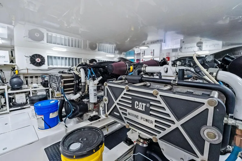 Slide: The Image of Engine room of 2015 Viking 66' Convertible yacht with CAT Marine Power engines. - 56