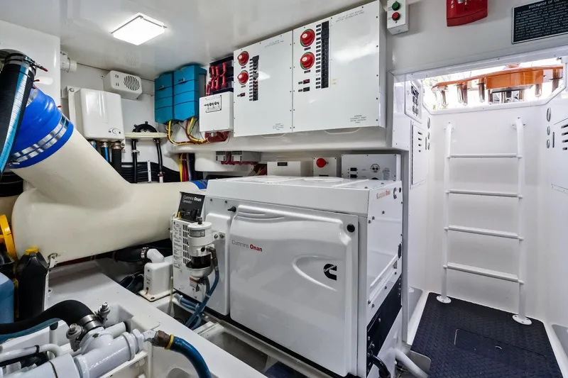 Slide: The Image of Engine room of 2015 Viking 66' Convertible yacht with Cummins Onan generator. - 59