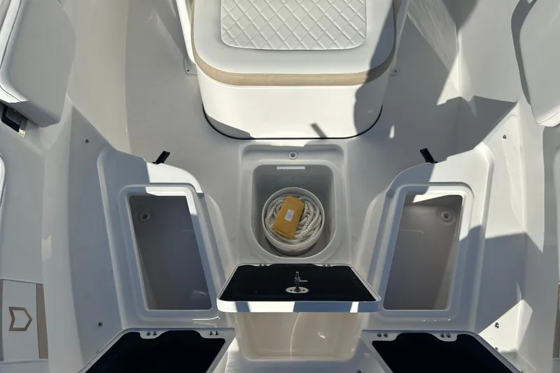 Slide: The Image of 2026 Sea Fox 228 Commander boat interior with storage compartments and seating. - 16