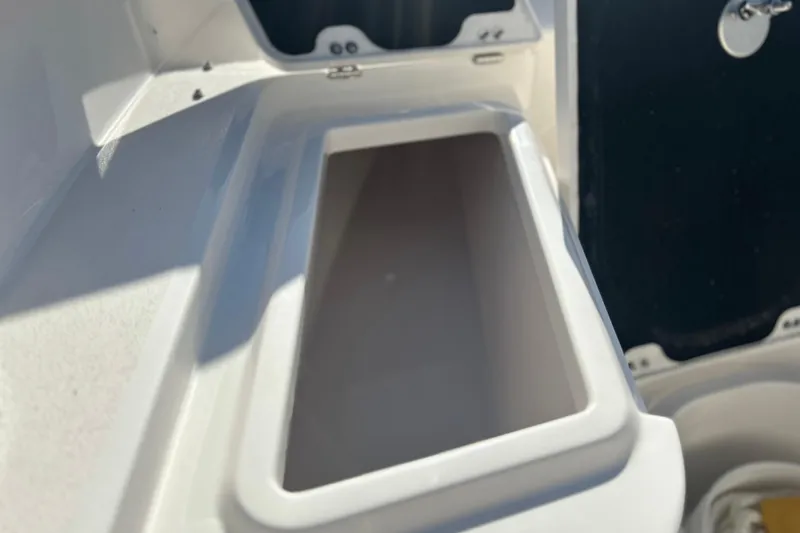Slide: The Image of Storage compartment on 2026 Sea Fox 228 Commander boat, featuring sleek white interior design. - 17