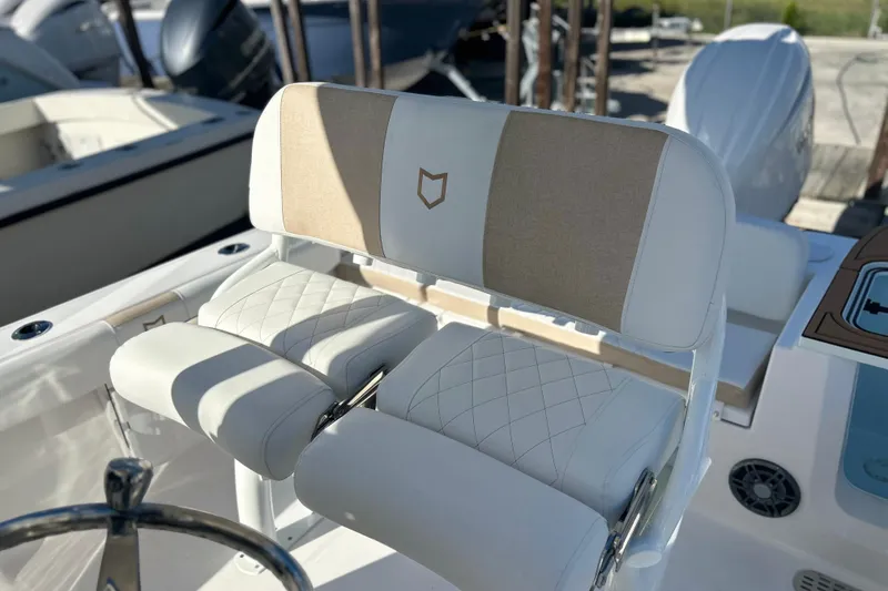 Slide: The Image of 2026 Sea Fox 228 Commander boat seats with elegant stitching and logo detail. - 27