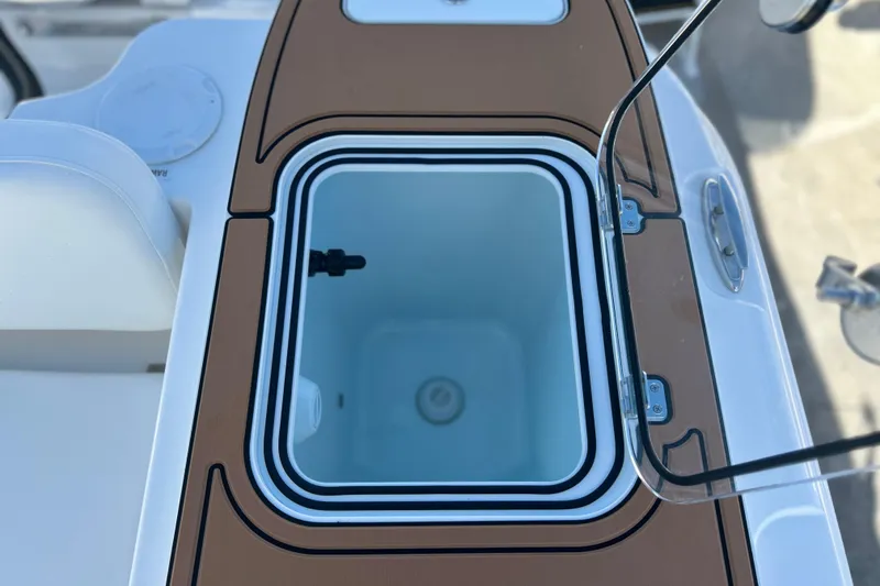 Slide: The Image of Livewell on 2026 Sea Fox 228 Commander boat, open lid, brown and white design. - 29