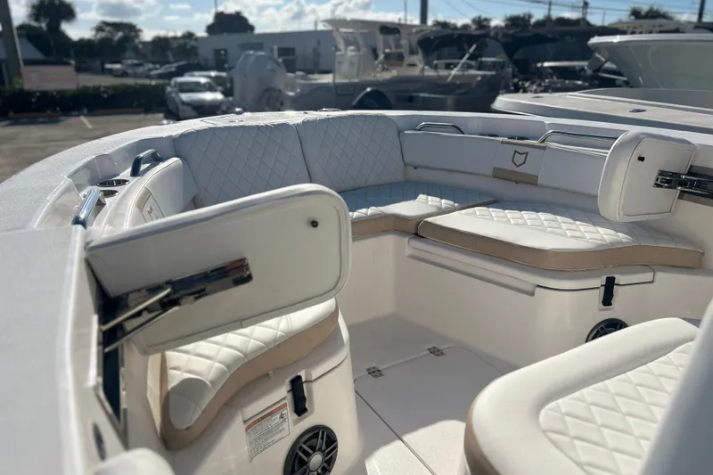 Slide: The Image of 2026 Sea Fox 228 Commander boat interior with cushioned seating and modern design. - 5