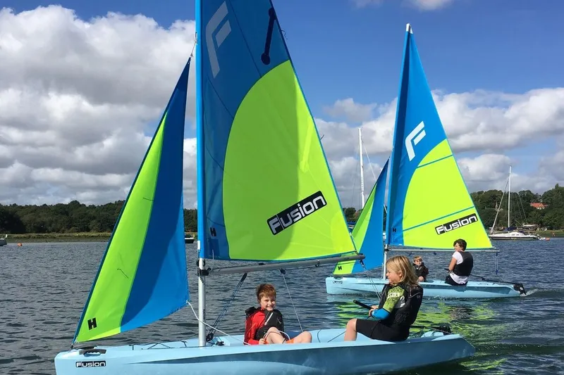 The Image of Sailors enjoying a sunny day on 2025 Fusion I sailboats by Fusion Sailboats. - 0