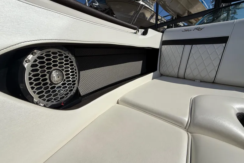 Slide: The Image of Luxurious interior of 2018 Sea Ray SLX 250 boat with premium seating and speaker system. - 17