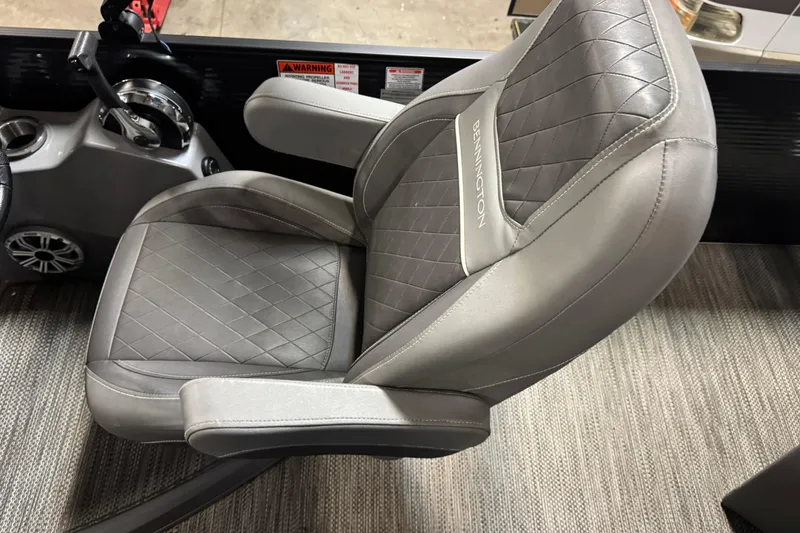 Slide: The Image of Captain's chair in 2020 Bennington SXP 25 SSBXP boat, featuring quilted gray upholstery. - 18