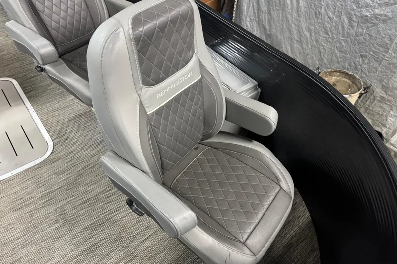 Slide: The Image of Luxurious seating in 2020 Bennington SXP 25 SSBXP pontoon boat, featuring diamond-stitched upholstery. - 8