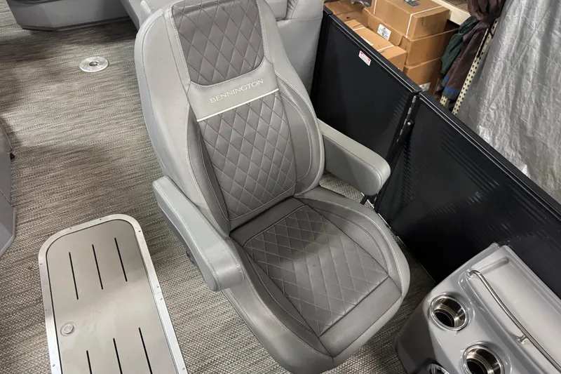 Slide: The Image of Gray captain's chair in 2020 Bennington SXP 25 SSBXP boat interior. - 9