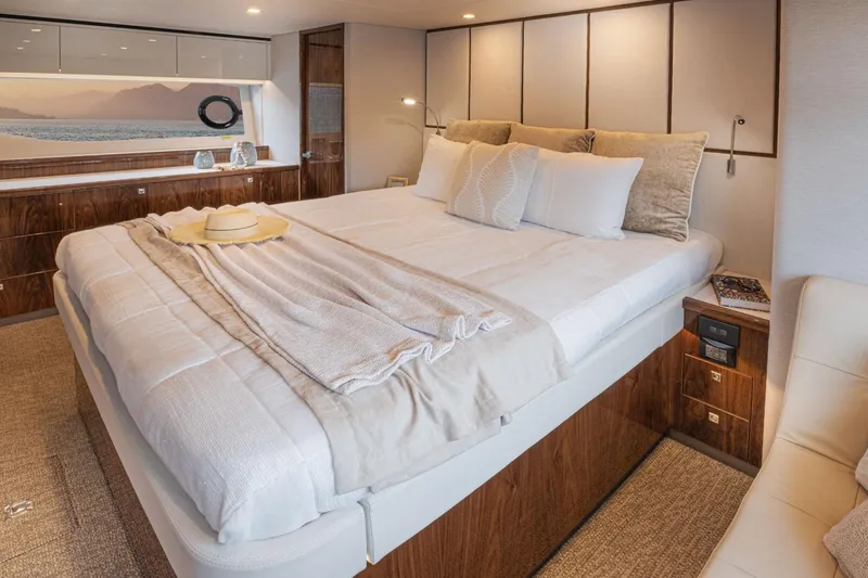 Slide: The Image of Luxurious bedroom in 2026 Riviera 64 Sports Motor Yacht Series II. - 13