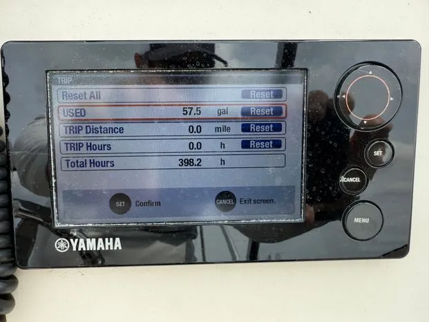 Slide: The Image of Yamaha display showing fuel usage and trip data on 2017 Grady-White Freedom 235 boat. - 9