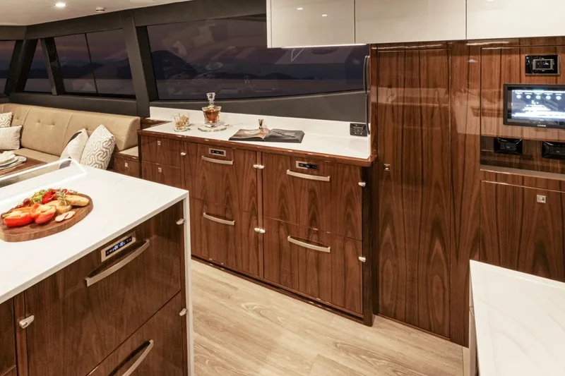 Slide: The Image of Luxurious interior of 2026 Riviera 72 Sports Motor Yacht Series II kitchen area. - 10