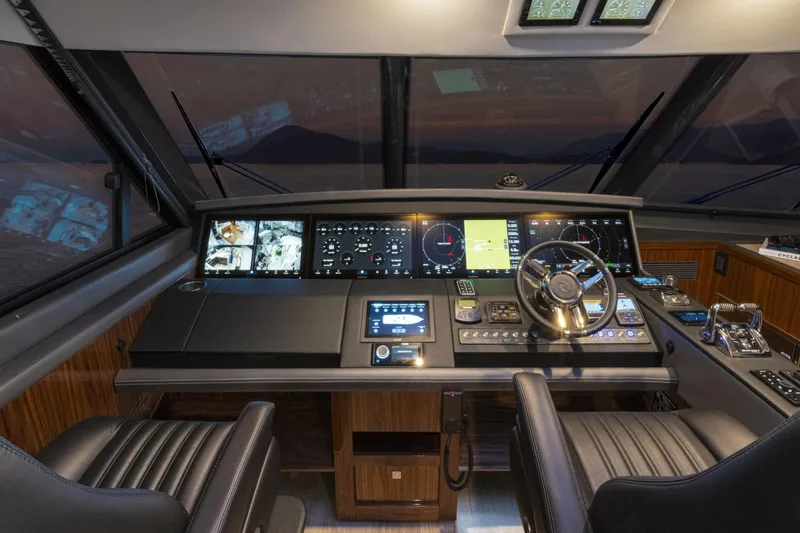 Slide: The Image of Cockpit of 2026 Riviera 72 Sports Motor Yacht Series II with advanced navigation systems. - 15