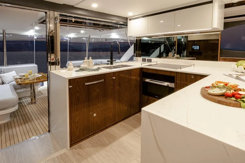 Slide: The Image of Luxurious kitchen interior of 2026 Riviera 72 Sports Motor Yacht Series II. - 9