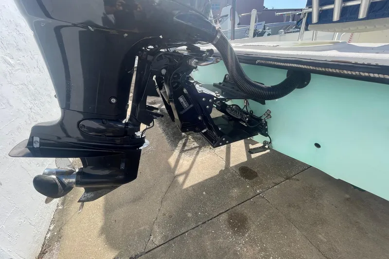 Slide: The Image of Outboard motor of a 2012 Slayer VS 19 boat, shown from the rear. - 9