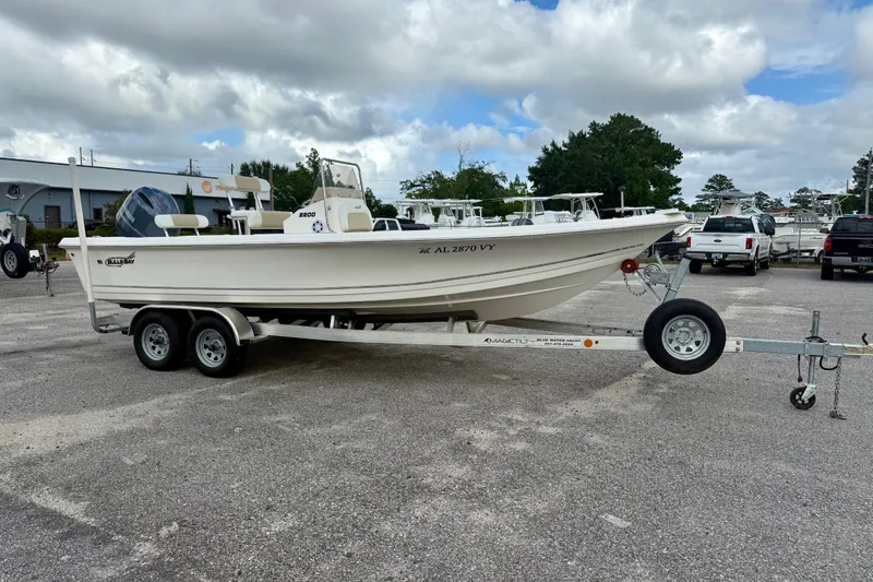 The Image of 2023 Bulls Bay 2200 boat on trailer, parked outdoors under cloudy sky. - 0