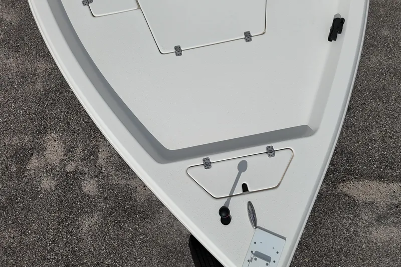 Slide: The Image of 2023 Bulls Bay 2200 boat deck, featuring storage compartments and sleek design. - 16