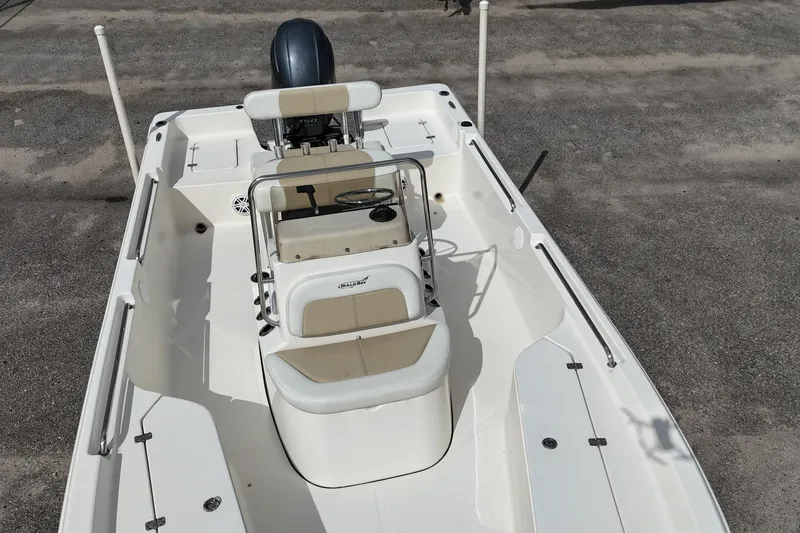 Slide: The Image of 2023 Bulls Bay 2200 boat interior with seating and steering console. - 17