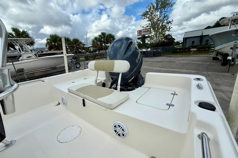 Slide: The Image of 2023 Bulls Bay 2200 boat with Yamaha outboard motor, parked outdoors. - 5