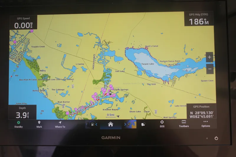 Slide: The Image of Garmin GPS display on 2018 Scout 380 LXF, showing nautical map and coordinates. - 13