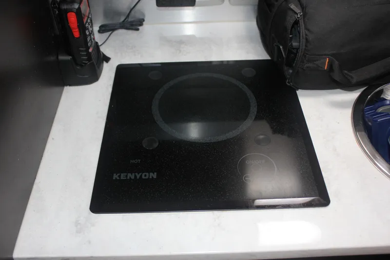 Slide: The Image of Kenyon cooktop on 2018 Scout 380 LXF boat's countertop. - 31