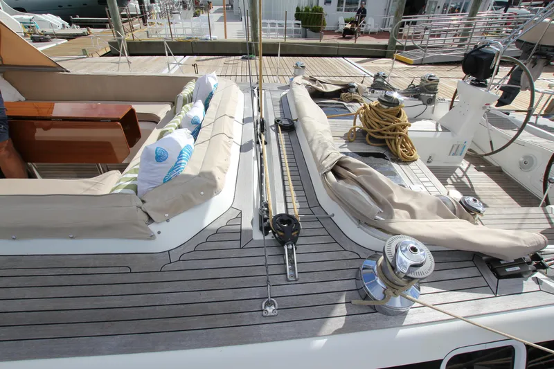 Slide: The Image of Deck of 2004 Nautor Swan 62 yacht with seating and nautical equipment. - 15