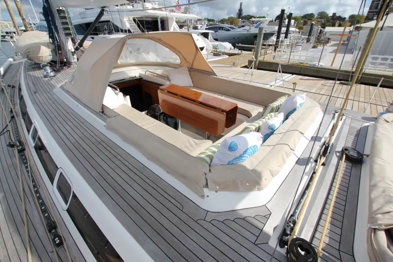 Slide: The Image of Luxurious 2004 Nautor Swan 62 yacht with elegant deck seating and stylish cushions. - 17