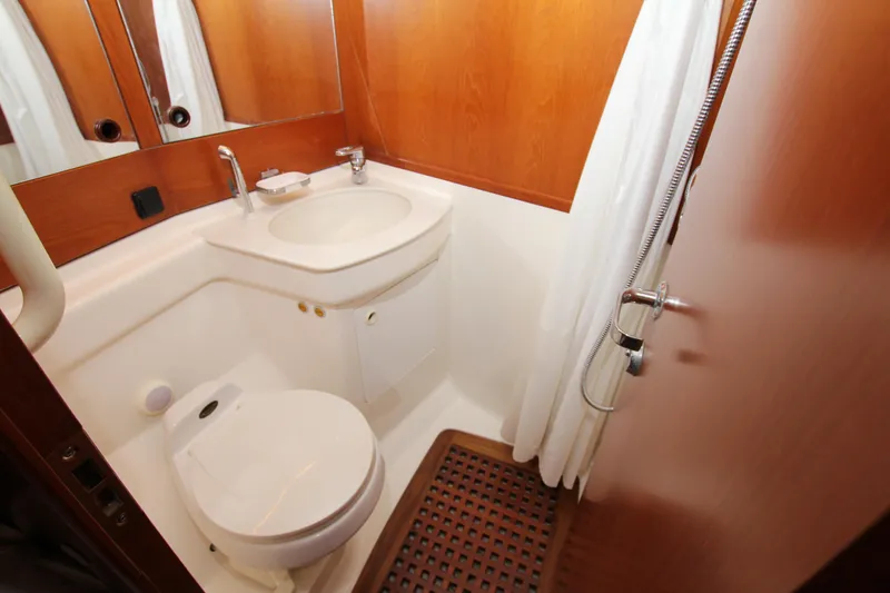 Slide: The Image of Bathroom interior of 2004 Nautor Swan 62 yacht with sink, toilet, and shower. - 29
