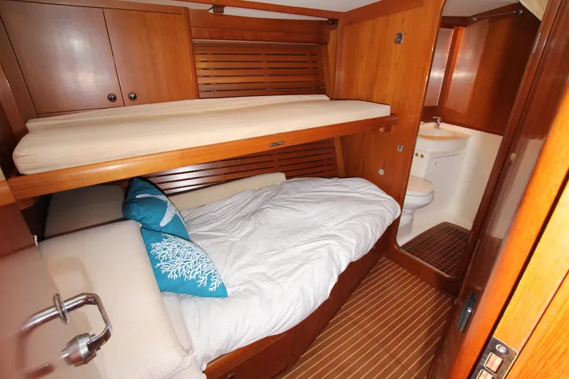 Slide: The Image of Cozy cabin interior of 2004 Nautor Swan 62 yacht with bunk beds and ensuite bathroom. - 33