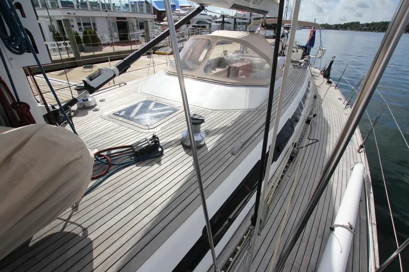Slide: The Image of 2004 Nautor Swan 62 yacht deck with sleek design and modern fittings. - 8