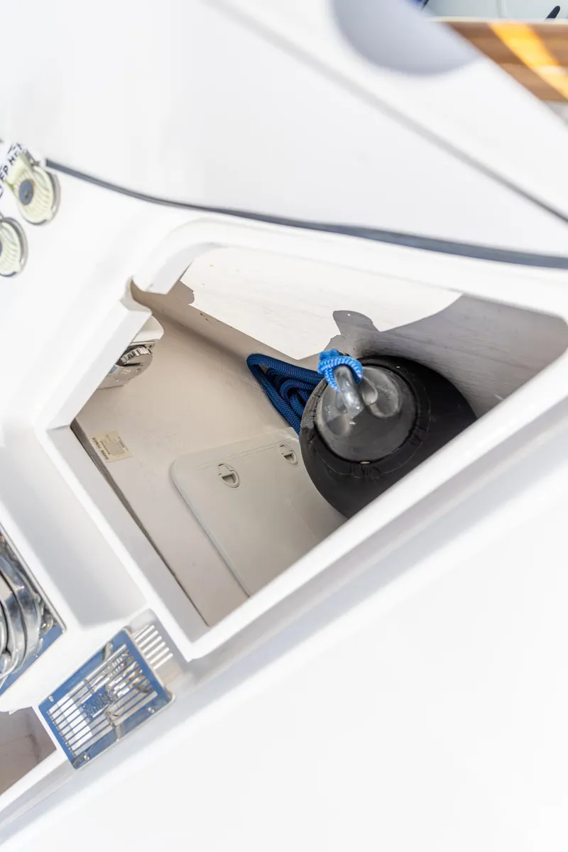 Slide: The Image of Storage compartment on a 2009 Sabre 52 Express boat with nautical equipment. - 12