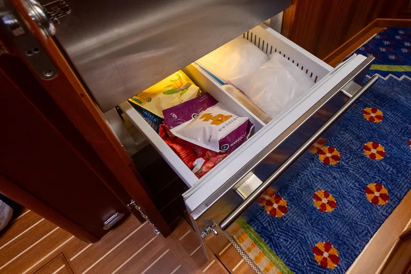 Slide: The Image of Drawer freezer with assorted frozen foods in a 2009 Sabre 52 Express yacht interior. - 30