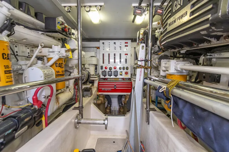 Slide: The Image of Engine room of 2009 Sabre 52 Express yacht, featuring CAT marine power systems. - 4