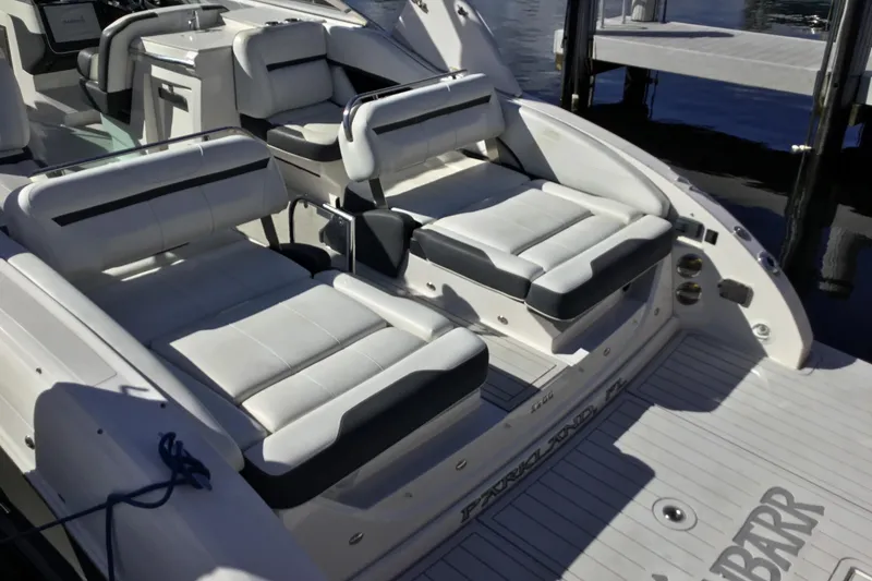 Slide: The Image of 2017 Regal 3200 Bowrider boat with luxurious seating and sleek design. - 44