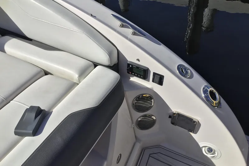 Slide: The Image of 2017 Regal 3200 Bowrider interior with seating, controls, and speakers. - 45