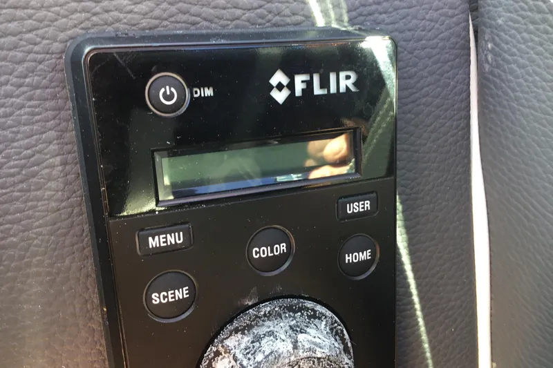 Slide: The Image of Control panel of a 2017 Regal 3200 Bowrider featuring FLIR system buttons. - 63