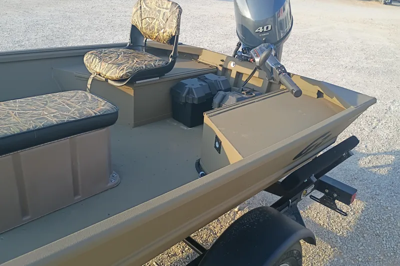 Slide: The Image of 2026 G3 Gator Tough 16 FL boat with camo seats and Yamaha 40 engine. - 5