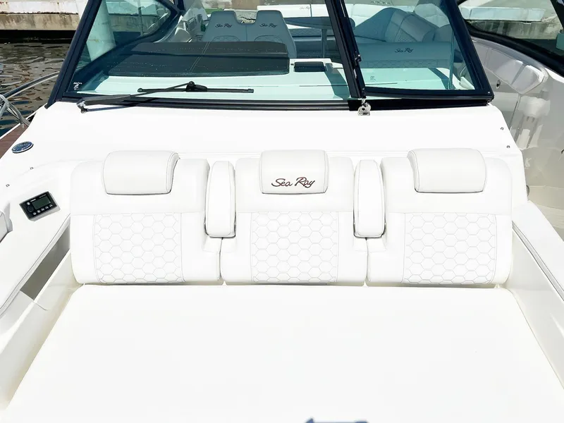 Slide: The Image of 2019 Sea Ray Sundancer 320 Outboard with luxurious white seating and sleek design. - 16