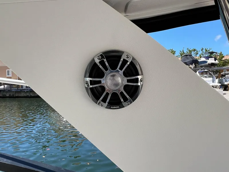 Slide: The Image of Speaker on 2019 Sea Ray Sundancer 320 Outboard, dockside view with water and boats. - 40