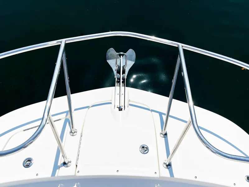 Slide: The Image of Bow of 2019 Sea Ray Sundancer 320 Outboard with stainless steel railings and anchor. - 42
