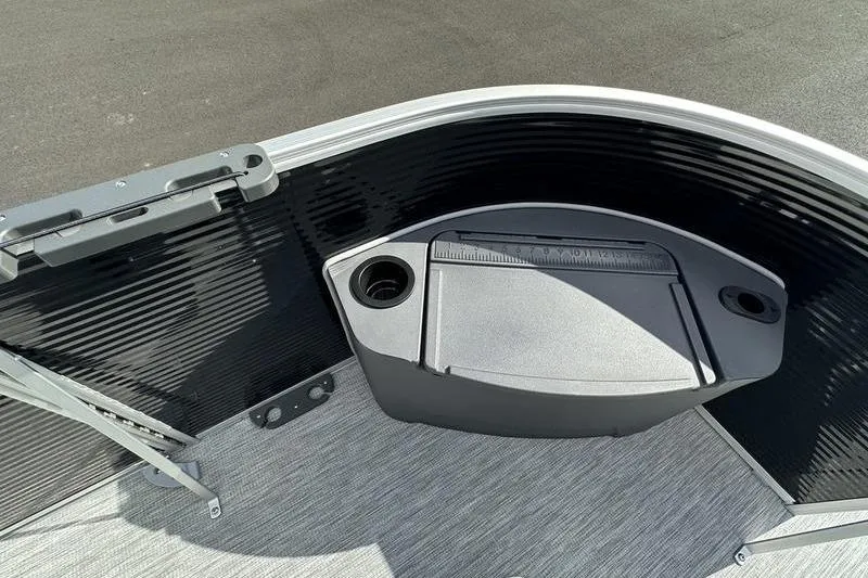 Slide: The Image of 2026 Bennington S 20 SF boat interior with seating and control panel. - 21
