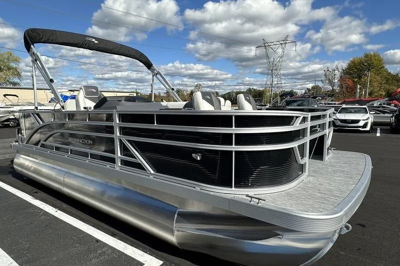 Slide: The Image of 2026 Bennington S 20 SF boat helm with steering wheel and captain's chair. - 29