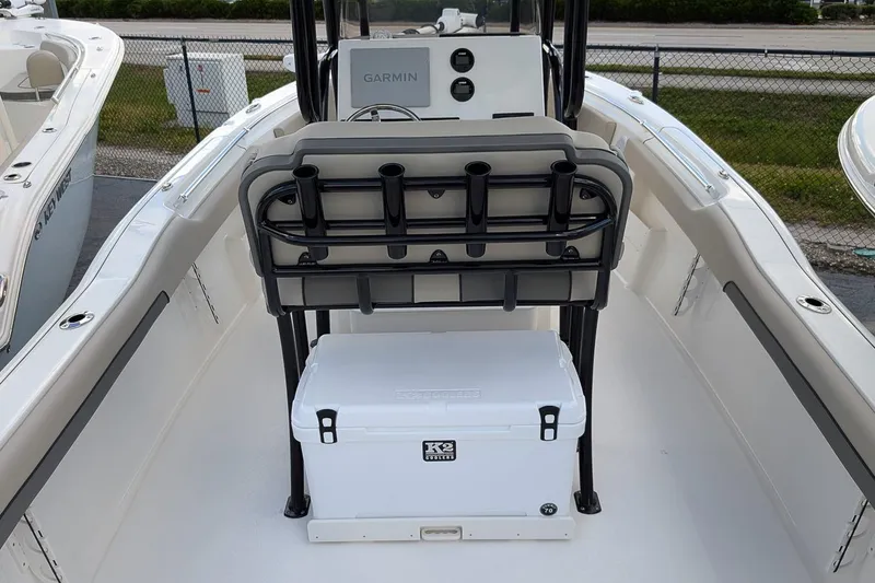 Slide: The Image of 2025 Key West 239 FS boat interior with Garmin system and cooler. - 13